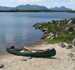 Canoe on beach of Loch Laidon above Rannoch in Scotland